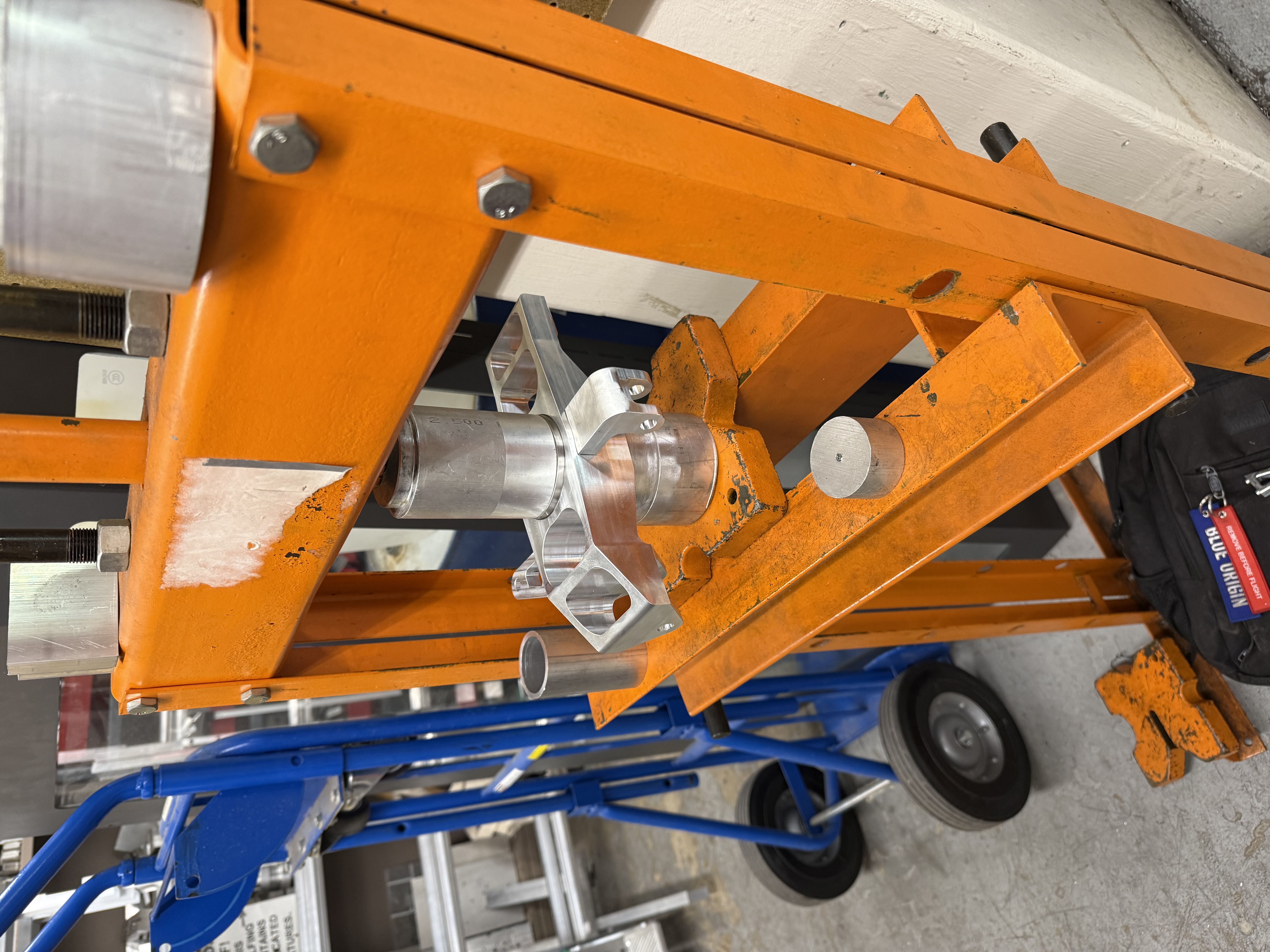 Using an arbor press to press-fit bearings into the uprights